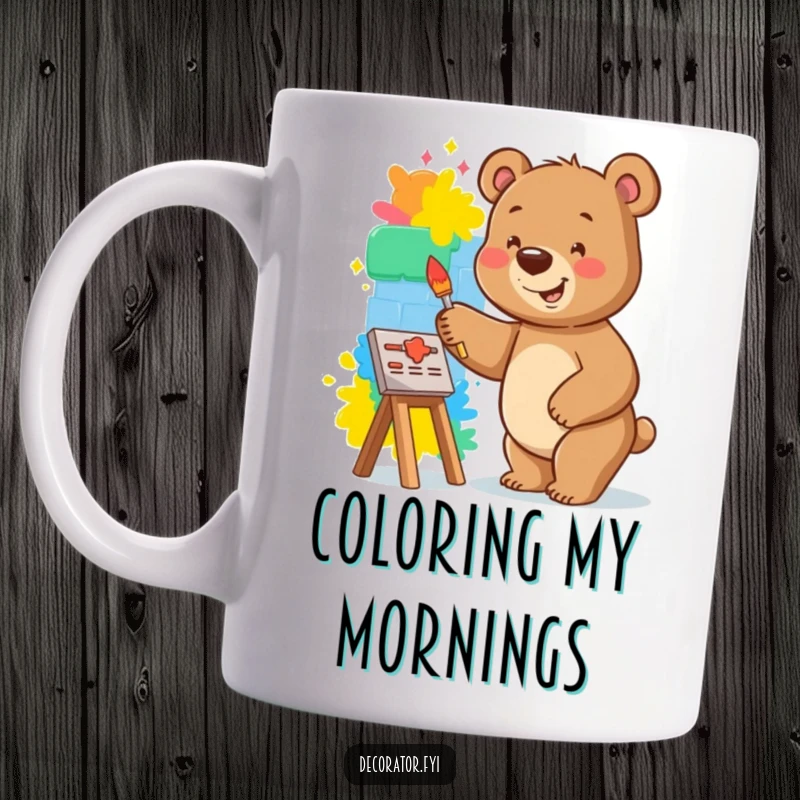 Funny bear mug showing a smiling bear happily painting a vibrant mural on a small wall, spreading colorful joy.
