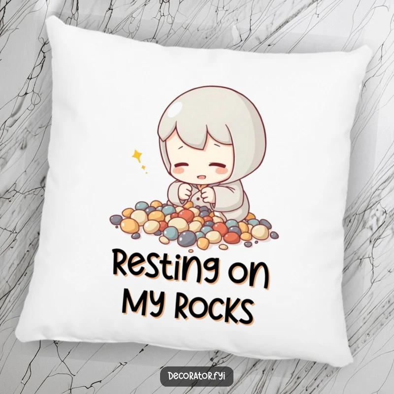 Funny pillow featuring a content character arranging tiny decorative stones, offering cozy comfort and a peaceful, humorous touch.