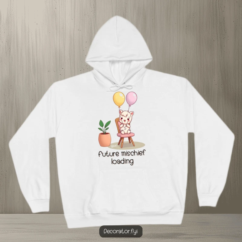Funny hoodie depicting a mischievous character playfully tying balloons to a chair, perfect for cozy, humorous moments.