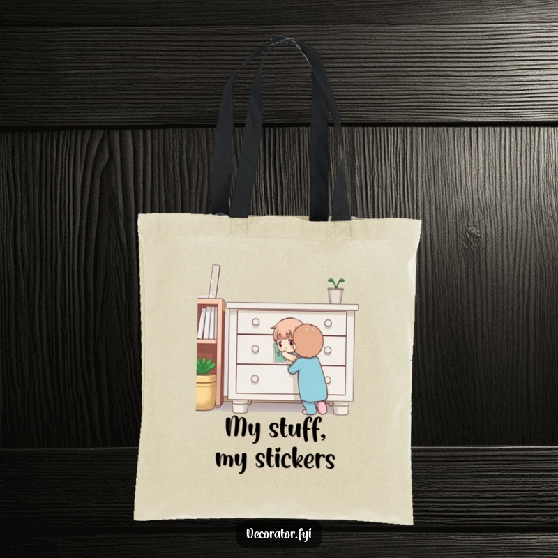 Funny tote bag featuring a determined character meticulously applying a sticker to furniture, ideal for carrying DIY supplies with a humorous touch.